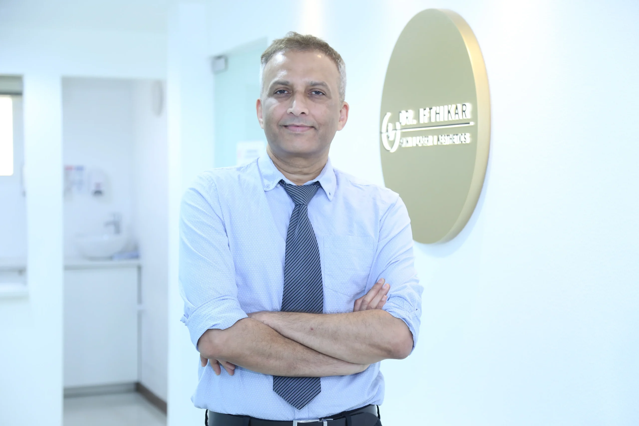 Dr. Ifthikar Ahammed, Medical Director and Specialist Dermatologist